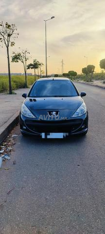 Peugeot 206 diesel, l'acheteur vient inspecter par lui-même