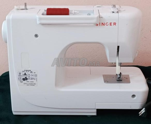 آلة خياطة سنجر - 2