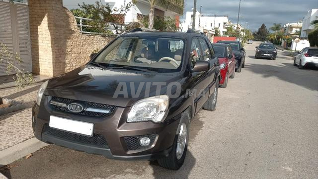 كيا سبورتاج 2010 – مالك أول – نصف جلد بيج - 2