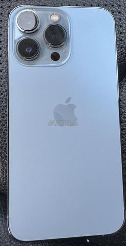 iPhone 13 Pro avec Apple Watch 9