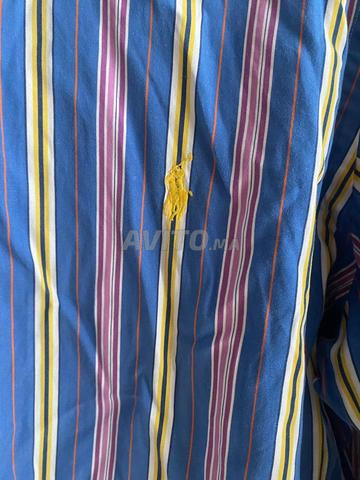 قميص بولو مقاس XL - 2