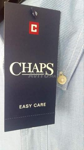 قميص أصلي ماركة جديدة مقاس XL