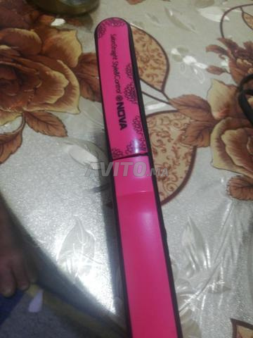 مكواة شعر NOVA وردي 180 درجة - نظيفة وتعمل بشكل جيد