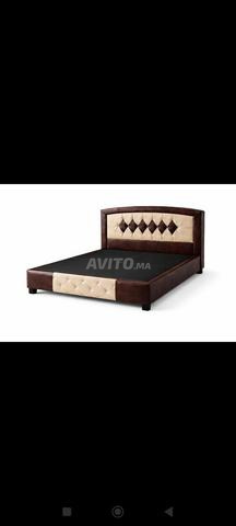 Lit 2 places sans matelas Lit d'occasion encore propre