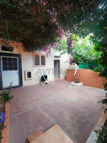 منزل للبيع بمساحة 133م² مع حديقة ومرآب - 2