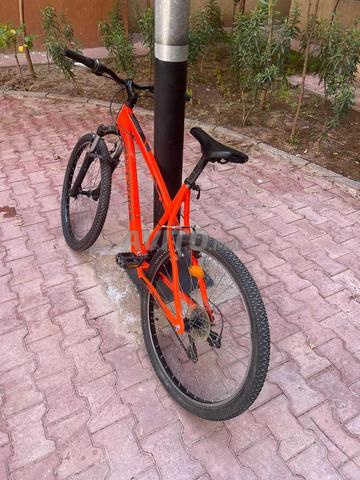 دراجة جبلية B’TWIN برتقالية – بحالة جيدة، جاهزة للركوب 🚴‍♂️ - 2