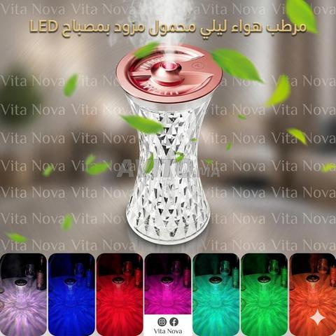 مرطب هواء ليلي محمول مزود بمصباح LED ملون.