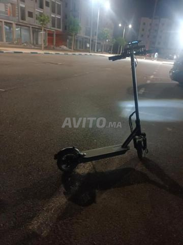 سكوتر كهربائي نظيف، لمن يأخذه أولاً بالهناء والشفاء. - 2