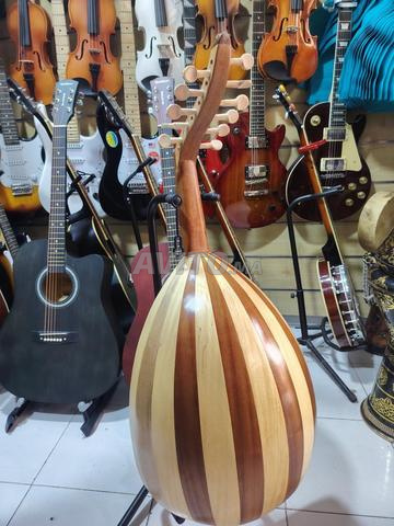 عود مع حقيبة وريشة مجانية - 2