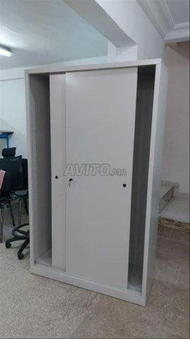 Armoire métallique porte coulisse/vestiaire/lit...