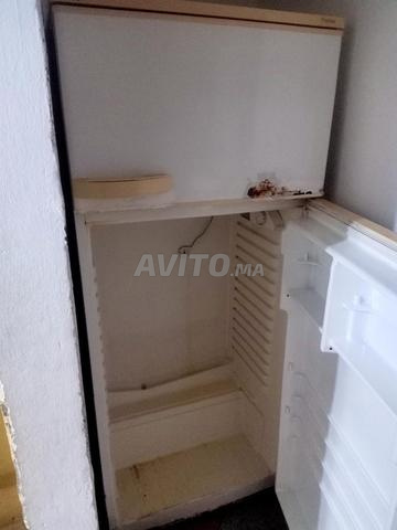 Réfrigérateur encore en très bon état, quelques petites rayures