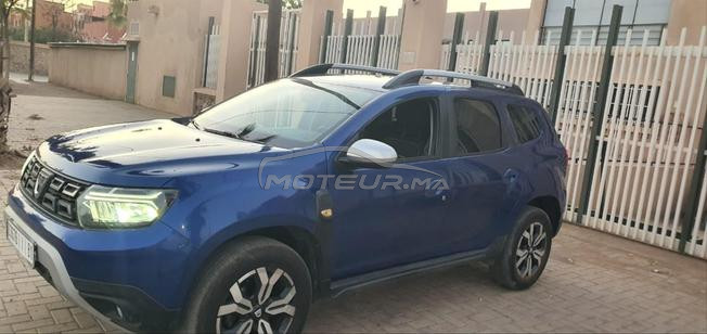 dacia duster mliha 3amra