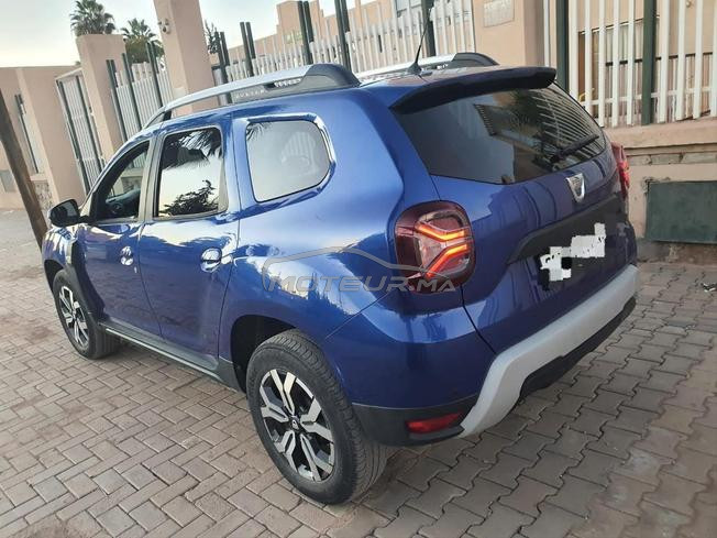 dacia duster mliha 3amra