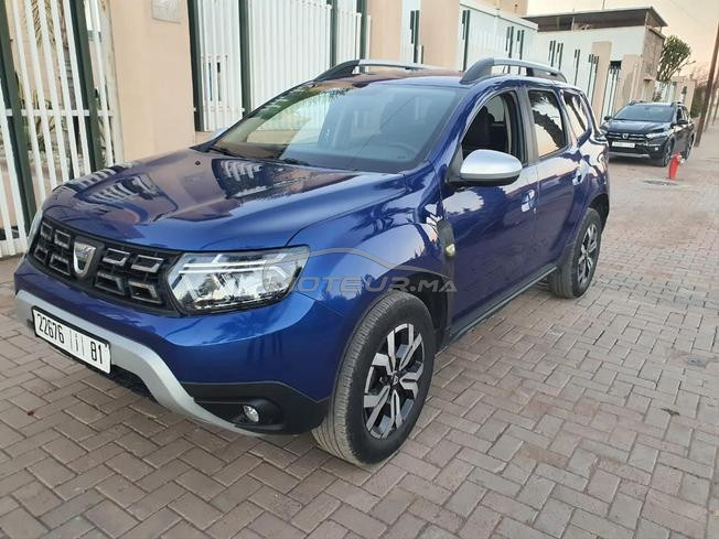 dacia duster mliha 3amra
