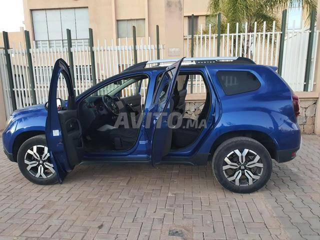 Dacia Duster mliha 3amra