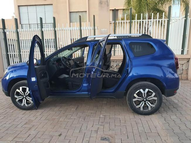 dacia duster mliha 3amra