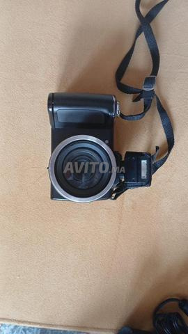 Olympus SP-620UZ (16 MP, zoom super compact) - 2