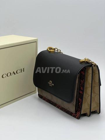 حقيبة كوتش بسلسلة CO6541