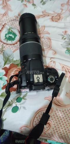 كاميرا كانون 100 دي - 2