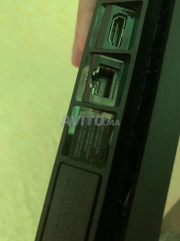 بلاي ستيشن 4 سليم مسطحة 1 تيرابايت، لا تزال نظيفة ومليئة بالألعاب