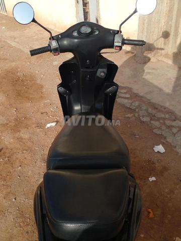 À vendre scooter Kymco Agility 50 cc noir ححح٦ - 2