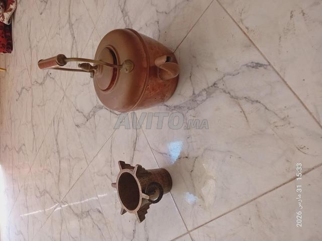 مهراس نحاسي عمره 70 عام وإبريق نحاسي أحمر