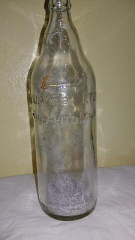 Ancienne bouteille gravée Oulmes État Marocain
