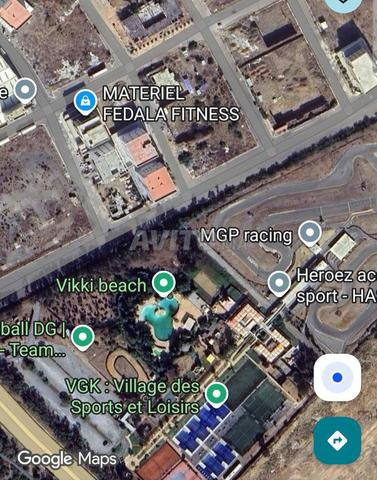 Terrain 1090 m2 angle zone ind. i5 karting - 2