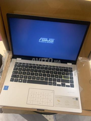 حاسوب محمول ASUS E410 كالجديد - 2