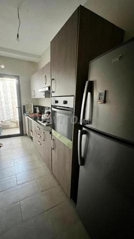 شقة بالطابق الأرضي بحديقة للإيجار - 2