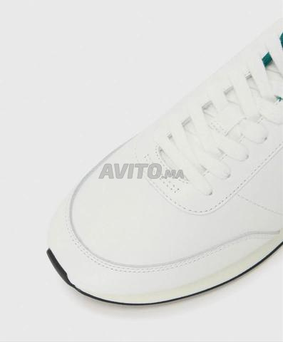 Calvin Klein Jeans مقاس 42 (كبير) يعادل 43 - 2