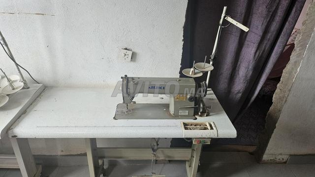 ماكينة خياطة أو ماكينة السورجيه - 2
