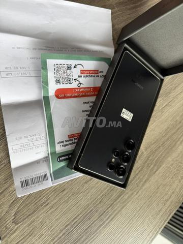 PRESQUE NEUF SAMSUNG S25 ULTRA 512GB / MAGASIN
