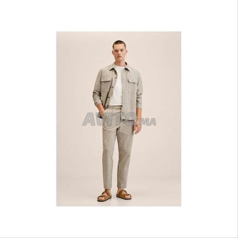 بنطلون مانجو مخطط بنسيج قطني متين