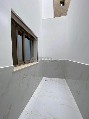 Appartements et locaux commerciaux enregistrés à vendre à Boujarrah - 2