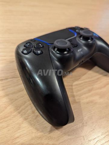 Manette PS5 noire très bon état - 2