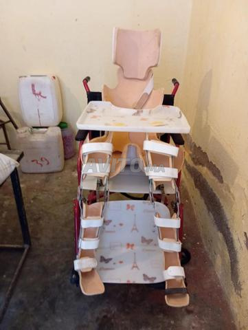 كرسي الأطفال ذوي الاحتياجات الخاصة