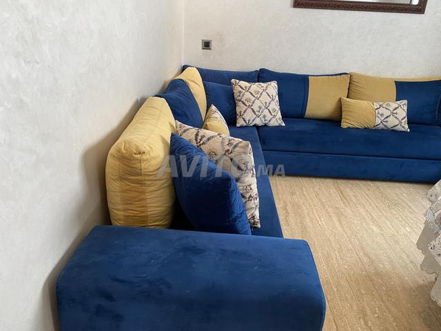 أريكة على شكل حرف U