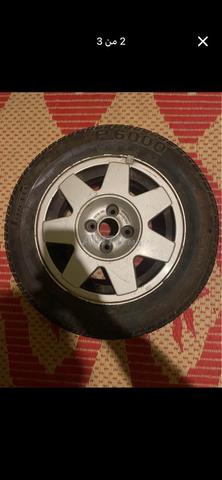 2 jantes aluminium avec pneus Pirelli 185/60 R14 - 2