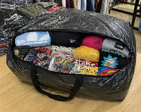 حزمة 19 قميصًا بعلامات تجارية - سعر مغرٍ