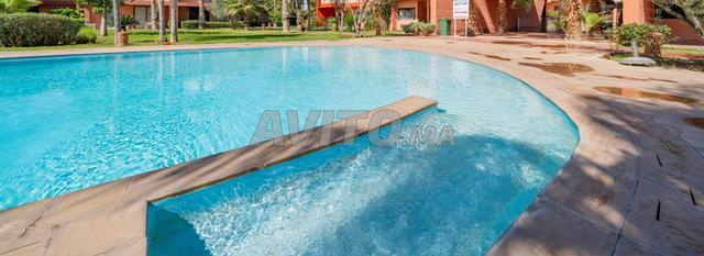 Appartement piscine luxe rez-de-chaussée