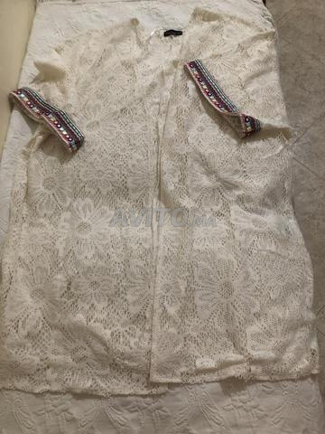 قمصان XL