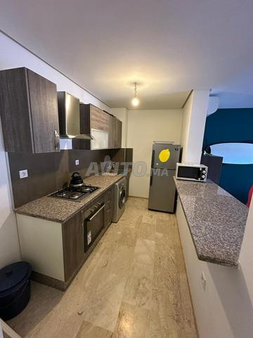 appartement avec grande terrasse face à la gare