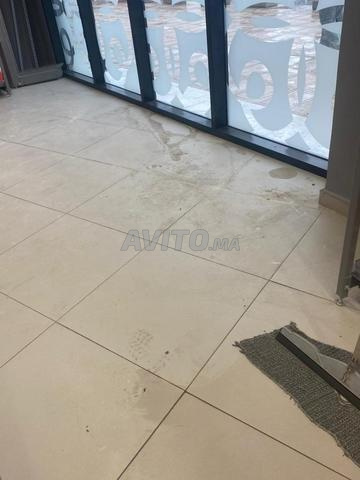 تنظيف شامل واحترافي للزجاج والأرضيات. - 2