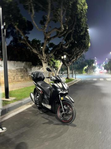 Sh350i 2023 ديوانة 2025 ماشية 24 ألف