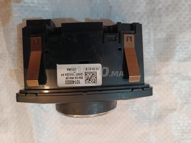 Deux commandes de phares Ford - 2