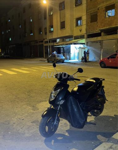 كيمكو أجليتي 4T - 2