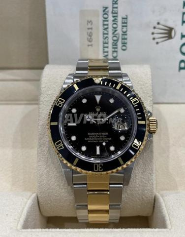 Rolex Submariner Date or jaune et acier