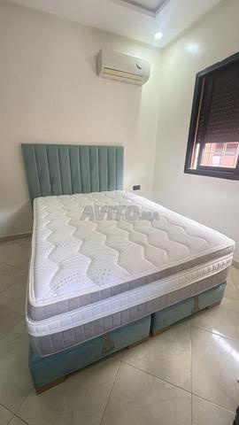 سرير مبطن بصناديق ومرتبة طبية - 2