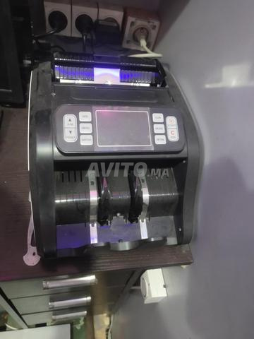 Machine à compter l'argent